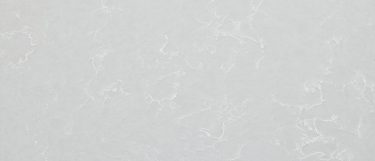 a smoked pearl quartz countertop surface that has a white background with subtle white veins