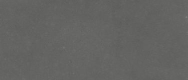 a shadow gray quartz countertop that has a gray flecked surface