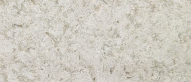 a portico cream quartz countertop that blends tones of cream, gray, and greige on its surface