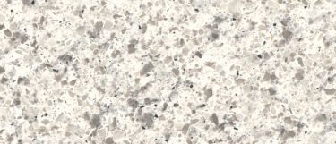 a peppercorn white quartz countertop that has a white base with pebbled design of warm gray speckles