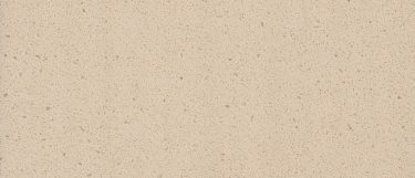 a pebble rock quartz countertop surface that has a beige color with warm pebble fleck details