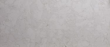 a Marbella White quartz countertop surface that has a soft white background with subtle veining design