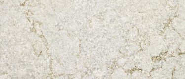 a Gray Lagoon quartz countertop surface that blends grays and gold veins over the grayish white background