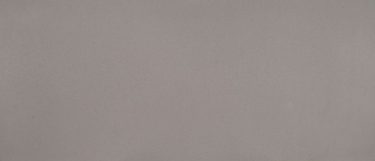 a Concerto quartz countertop surface that has a gray color with charcoal veins and speckle accents