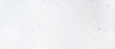 a Calacatta Ultra quartz countertop surface that features delicate linear veins over the warm white background