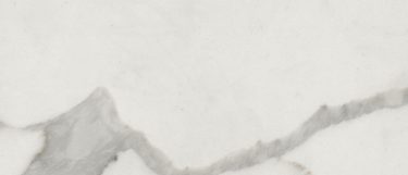a Calacatta Classique quartz countertop surface that features delicate veining pattern and subtle gray accents over the white background