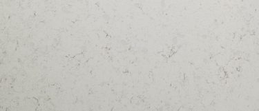 a Blanca Statuarietto quartz countertop surface that features gold and brown veins over the white background