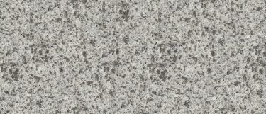 a riverbank quartz countertop that features flecks of brown, gray, and black over the white surface