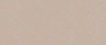 a Newport Sand quartz countertop surface that has a light design in cream color with warm speckles