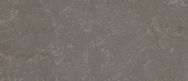 a Mercer Grey quartz countertop surface that has a gray colored design with subtle beige veining pattern