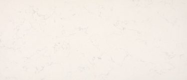a Jasmine White quartz countertop surface that features gray veining over the cool white background