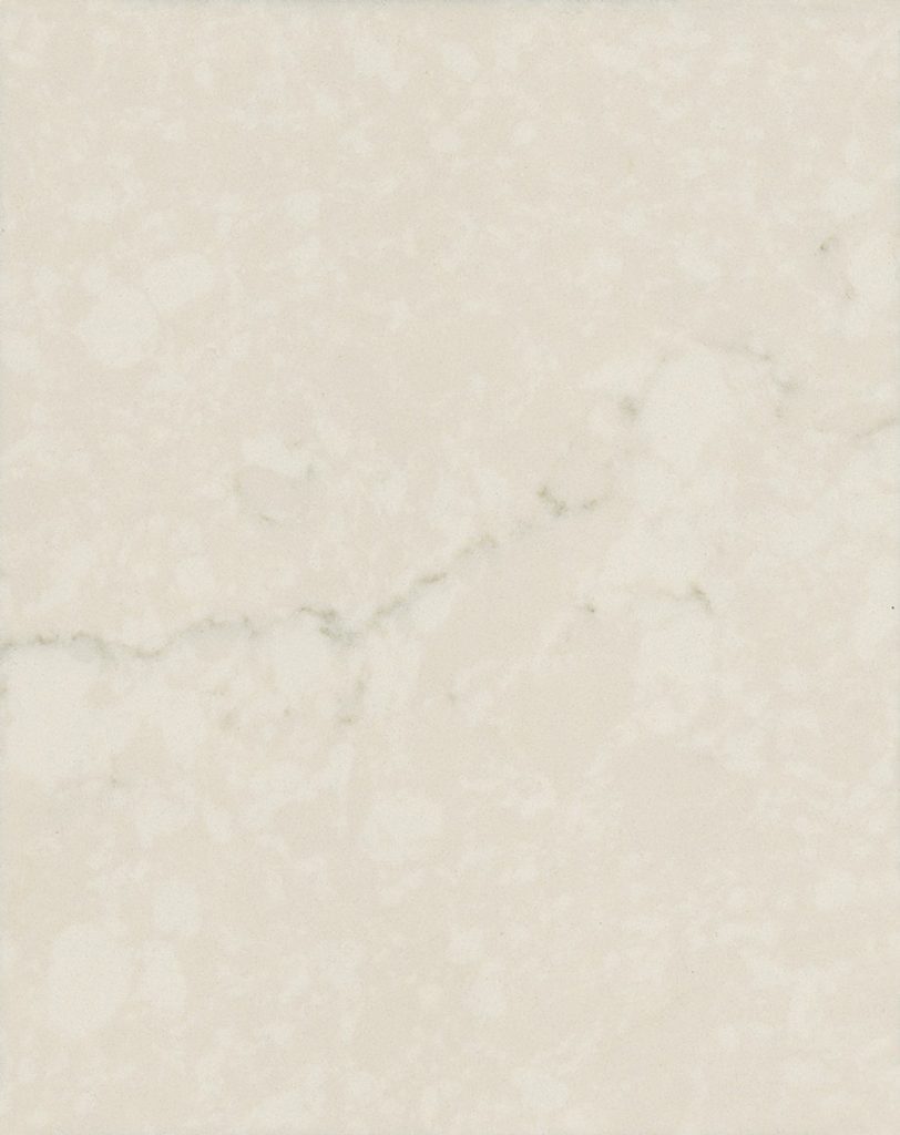 a Carrara Veil quartz countertop surface that features veining over the bright creamy white background