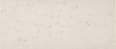 a Carrara Capezio quartz countertop surface that features hints of gray veining over the white background