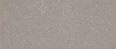 a Cabrini Gray quartz countertop surface that has a gray color with veining