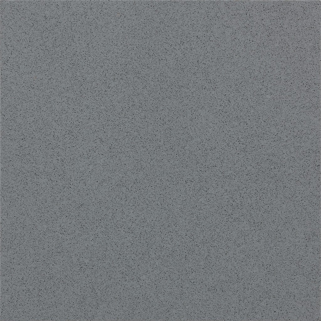 a Brushed Flannel quartz countertop surface that has a gray color with black spot details that creates a grainy texture