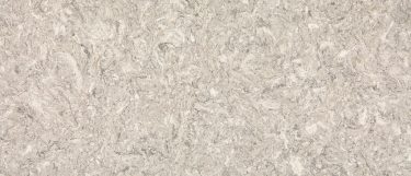 an Aspen Grey quartz countertop surface that features light and dark gray with creams in a swirling and veining pattern