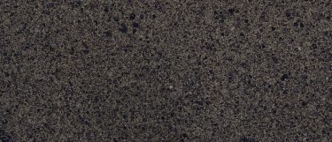 a Williston quartz countertop that has a dark design created by the black and gray specks all over its surface