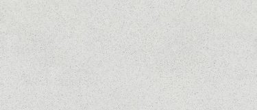 A Whitney quartz countertop that features small black specks all over its white surface