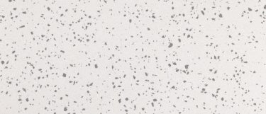 a white plains quartz countertop surface with gray specks against its creamy white background