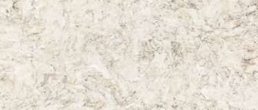 a warwick quartz countertop surface that combines warm and cool tone grays on a white base with black dots