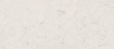 a torquay quartz countertop surface that has a light design with creams, whites, and very subtle patterns of gray