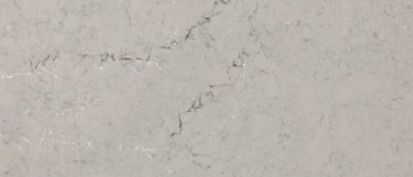 St. Giles quartz countertop surface that has gray and white veins across the medium toned gray background