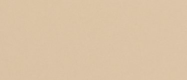 a Sanford quartz countertop surface that has a solid creamy yellow finish