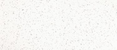 a salt lake quartz countertop surface that features warm dot speckles over the white background