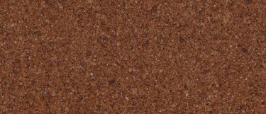 a reading quartz countertop surface that features speckles in cream, black, and brown