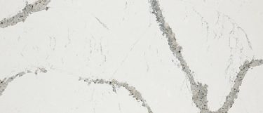 a Queensbury countertop surface that features prominent gray veining pattern over the white background