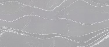 a Queen Anne quartz countertop surface that has a gray base with white stream veins