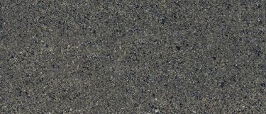 a Preston quartz countertop surface that mizes flecks of neutral colors with white specks