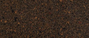 a nottingham quartz countertop surface that features a blend of brown, black, and gray tones