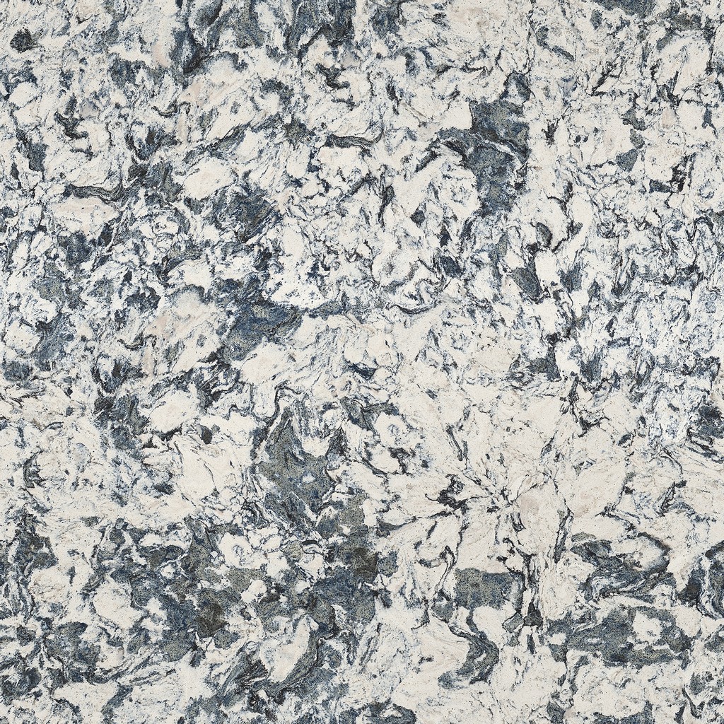 a Mayfair quartz countertop surface that features a light design with black and navy swirls over the white base