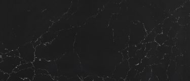 a Mammoth Cave quartz countertop surface that features white streams, clusters, and veins over the black background