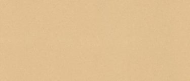 a Kentmere quartz countertop surface that features a buttery-yellow beige color