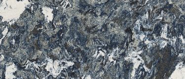 an Islington quartz countertop surface that has a swirling pattern in navy blue, white, and gray