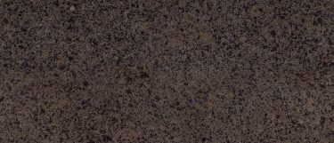 a Henley quartz countertop surface that has brown tones and black mosaic design