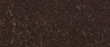 a Hamilton quartz countertop surface that features a dark design with specks of blacks, creams, and browns