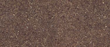 a Halstead quartz countertop surface that has a brown design with various shades of brown speckles