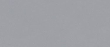 a Greystone quartz countertop surface that has a gray color with silver flecks