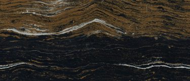 a Golden Dragon quartz countertop surface that features a current flow of gold in waves over the midnight black background