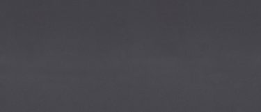a Fieldstone quartz countertop surface that has solid dark gray color