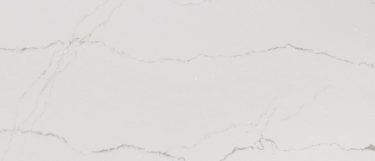 an Ella quartz countertop surface that features delicate dark gray veins over the white background