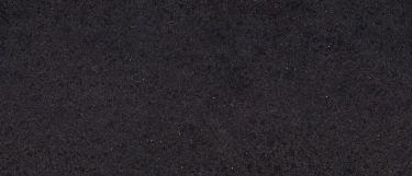 an Edinburough quartz countertop surface that features subtle patterns of metallic gray across the dark black background