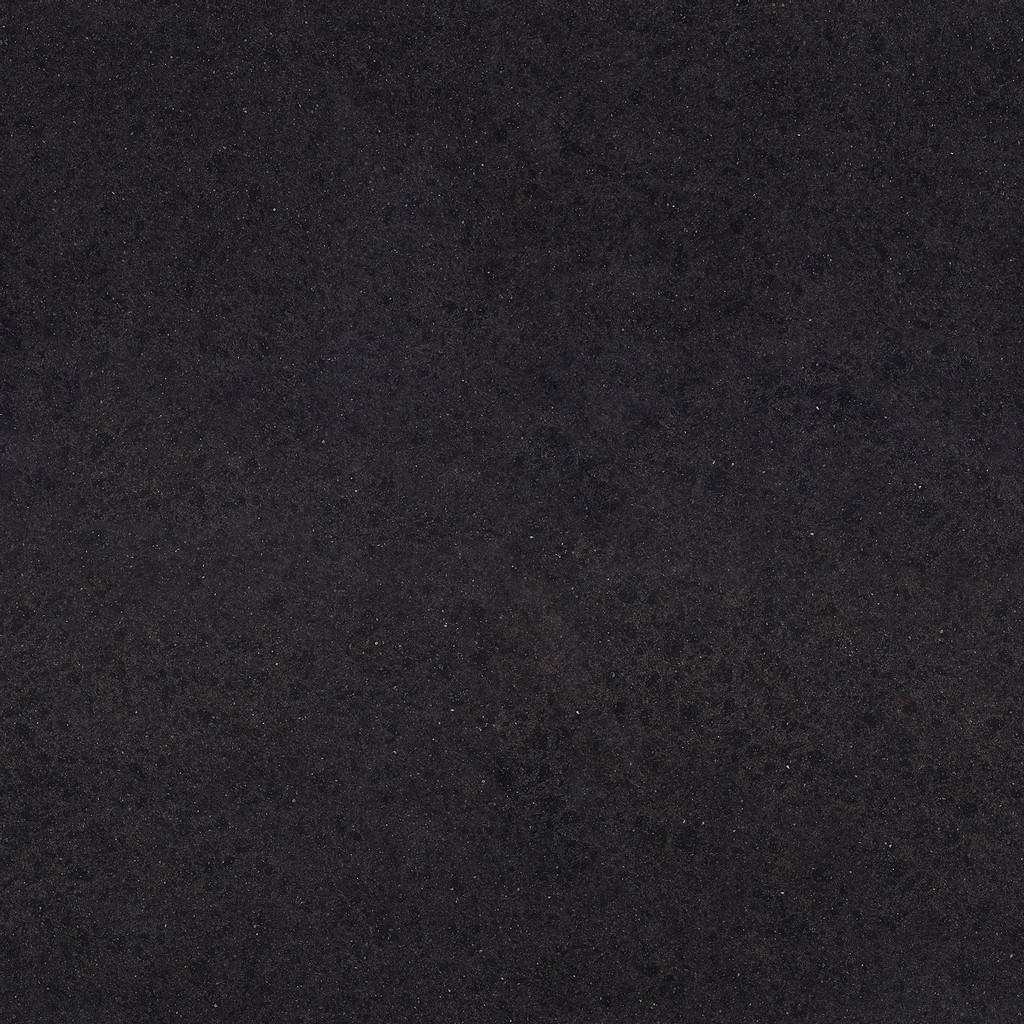 an Edinburough quartz countertop surface that features subtle patterns of metallic gray across the dark black background