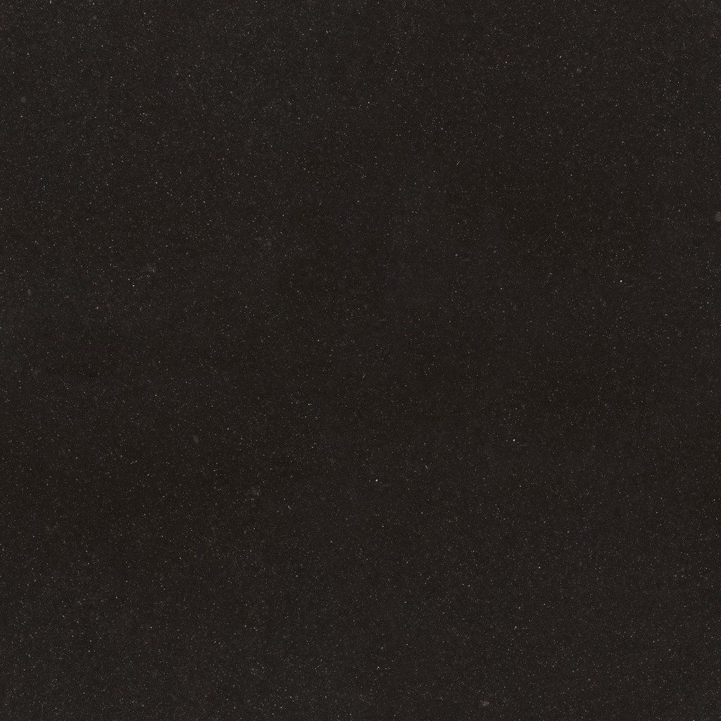 a Durham quartz countertop that features dark and tone gray surface with icy blues and grays details