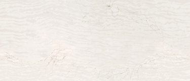 a Delgatie quartz countertop surface that has warm veining over the creamy white background