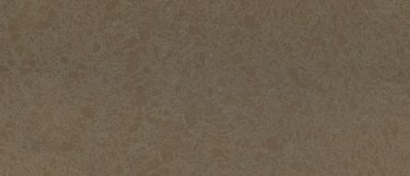 a Collybrooke quartz countertop surface that features earth tones with creams and white details
