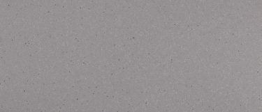 a Chicago Tower quartz countertop surface that features white, black, and gray specks over the gray background